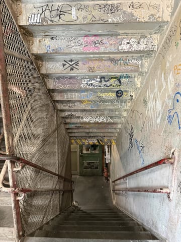 Graffiti-covered stairwell at MoMA PS1