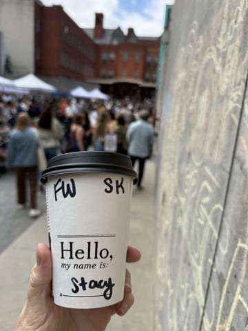 A coffee cup reading Hello, Stacy at MoMA PS1